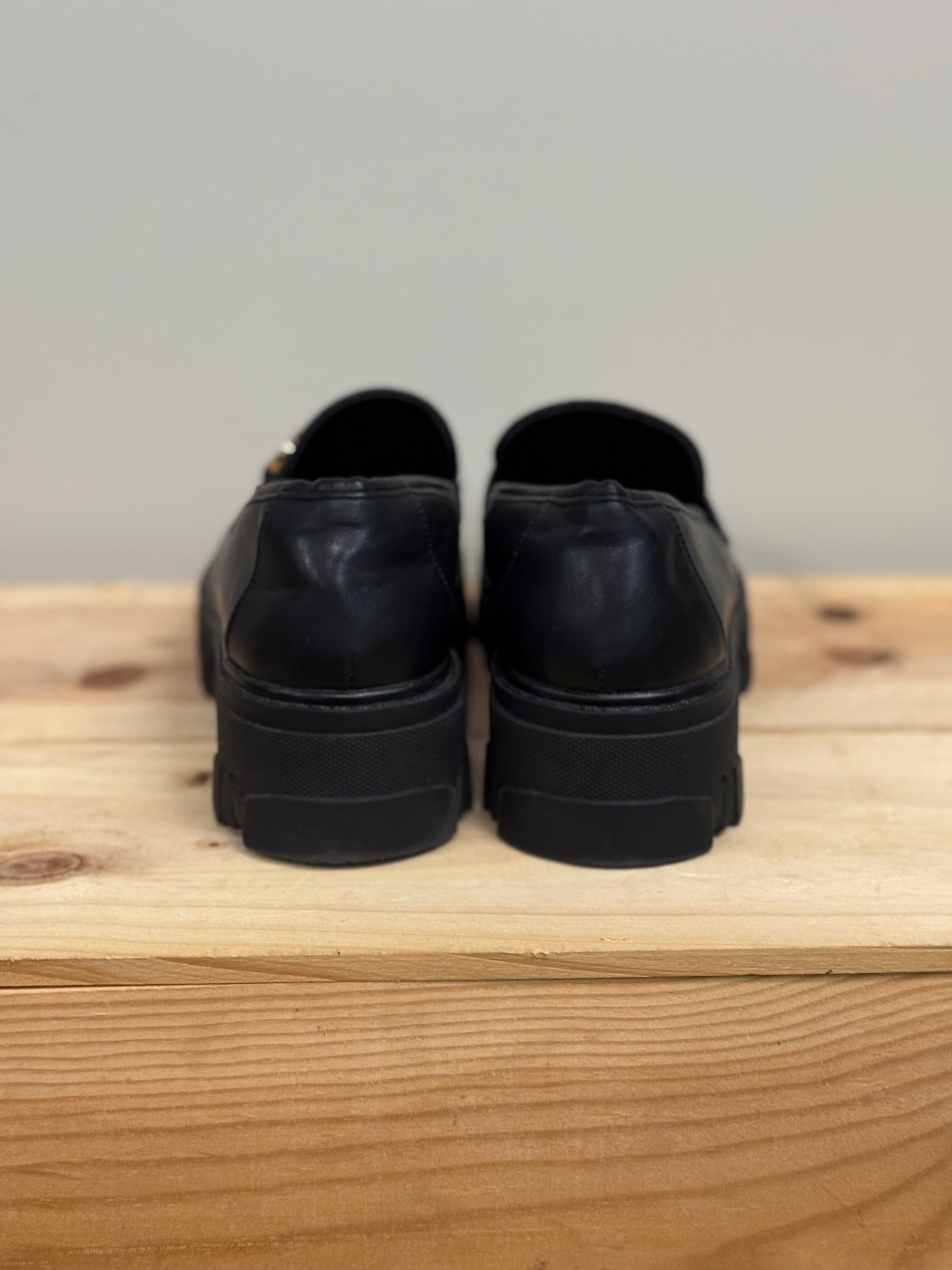 Romanciaga black platform loafers