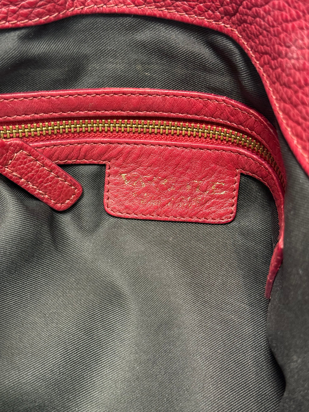 Varialle red leather cross body bag