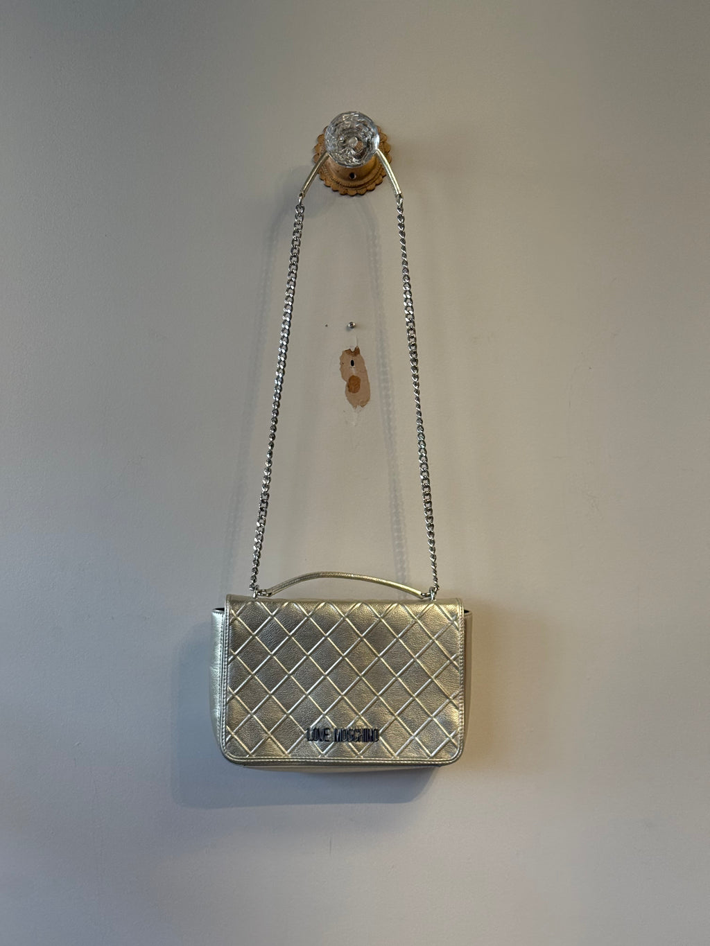 Love Moschino gold quilted shoulder bag