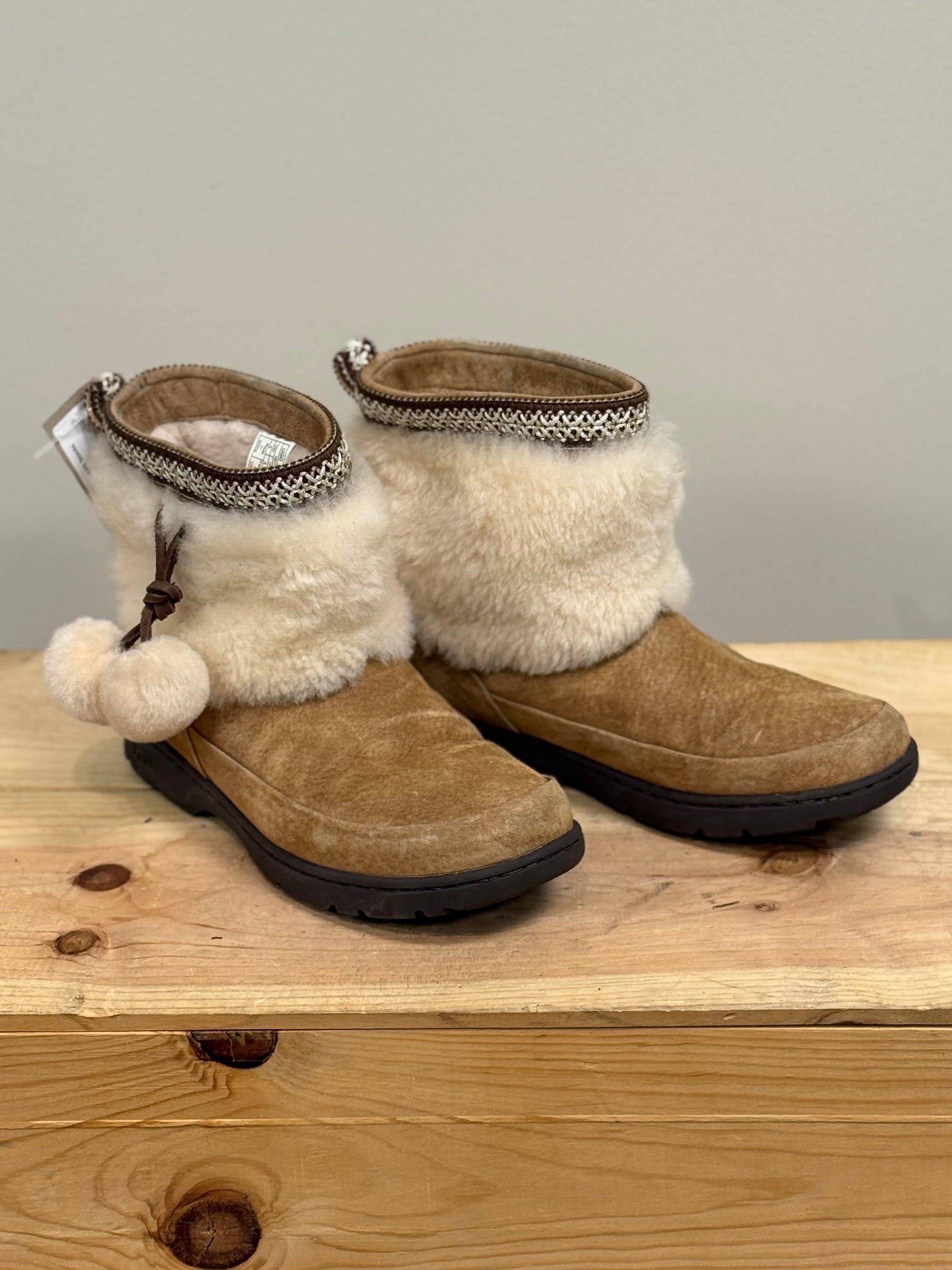 Ugg Brie sheepskin pom pom boots
