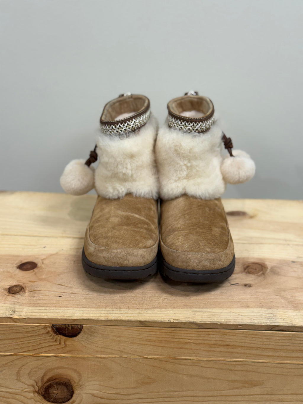 Ugg Brie sheepskin pom pom boots