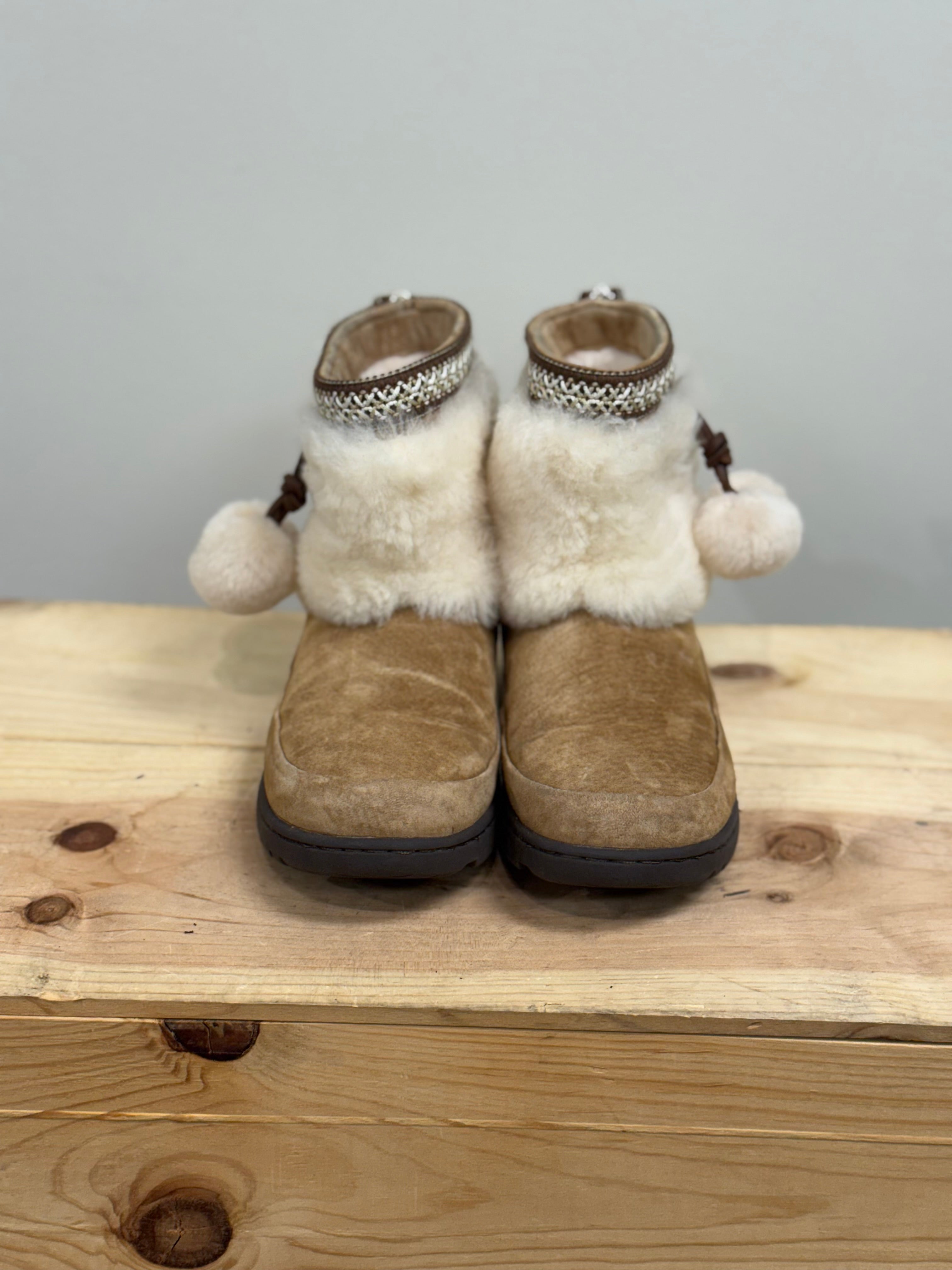 Ugg Brie sheepskin pom pom boots