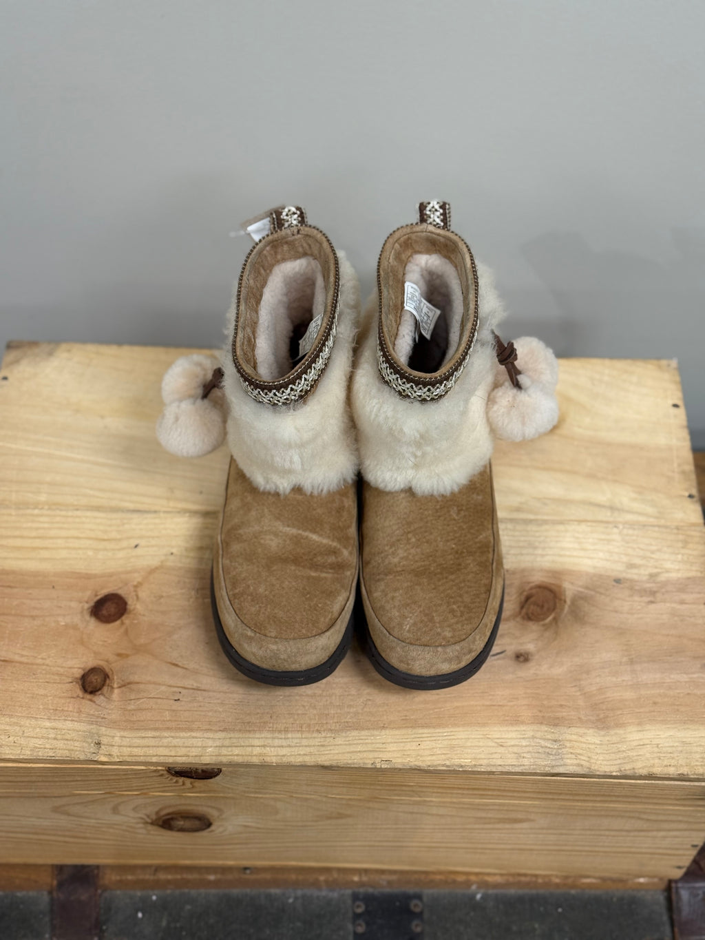 Ugg Brie sheepskin pom pom boots