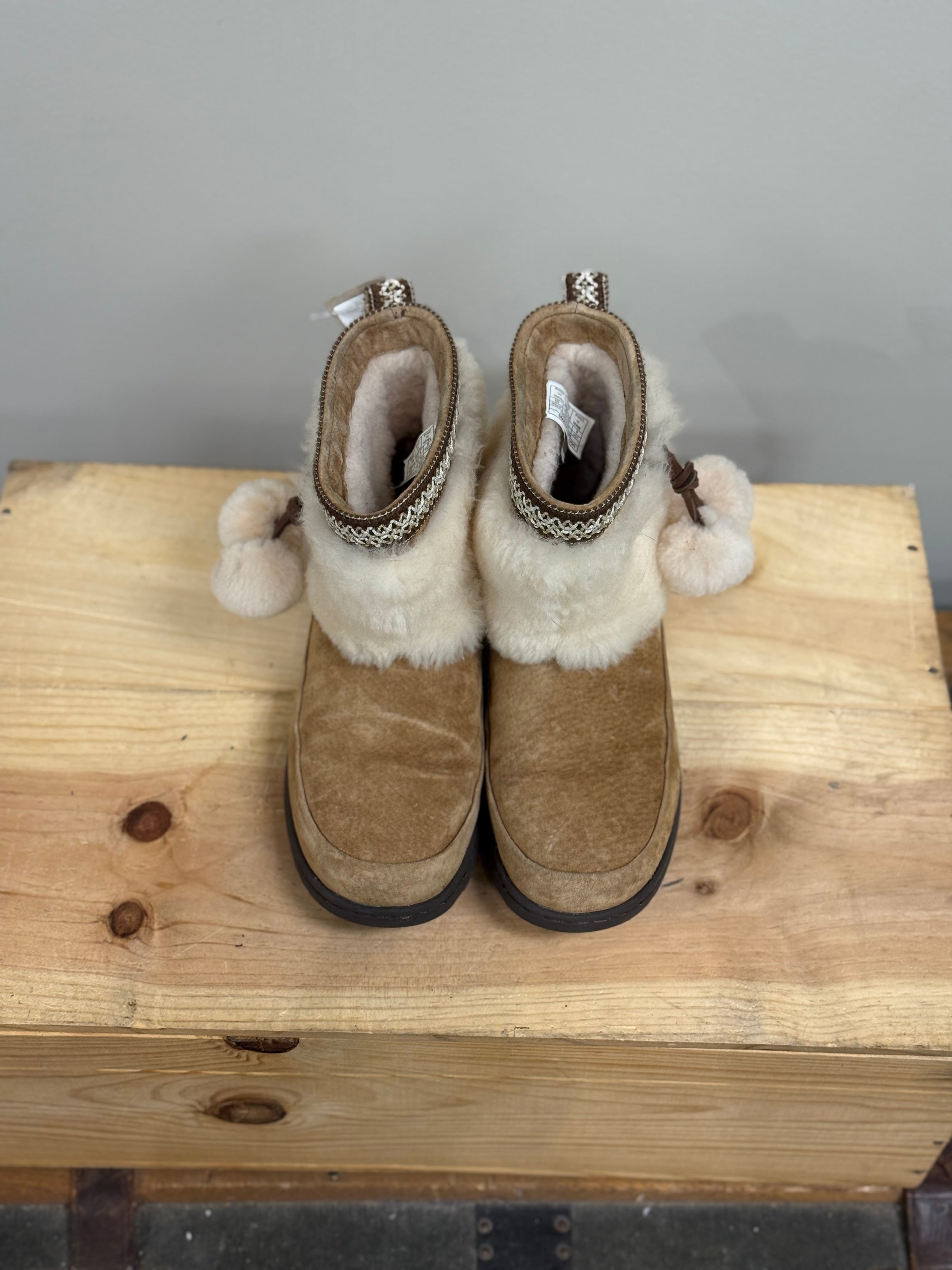 Ugg Brie sheepskin pom pom boots