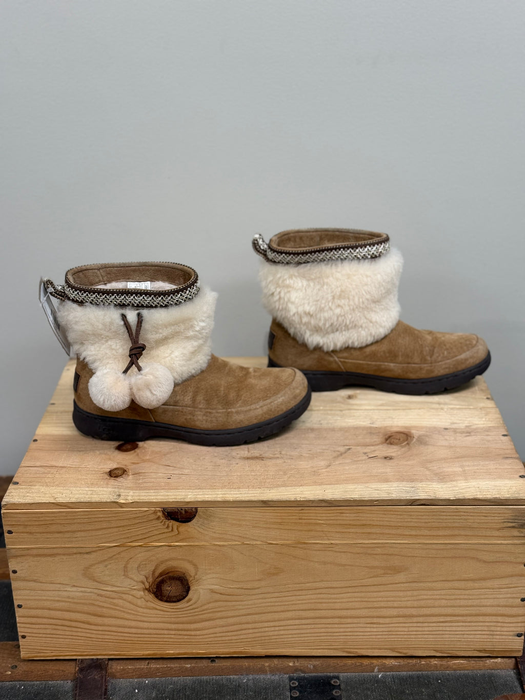 Ugg Brie sheepskin pom pom boots