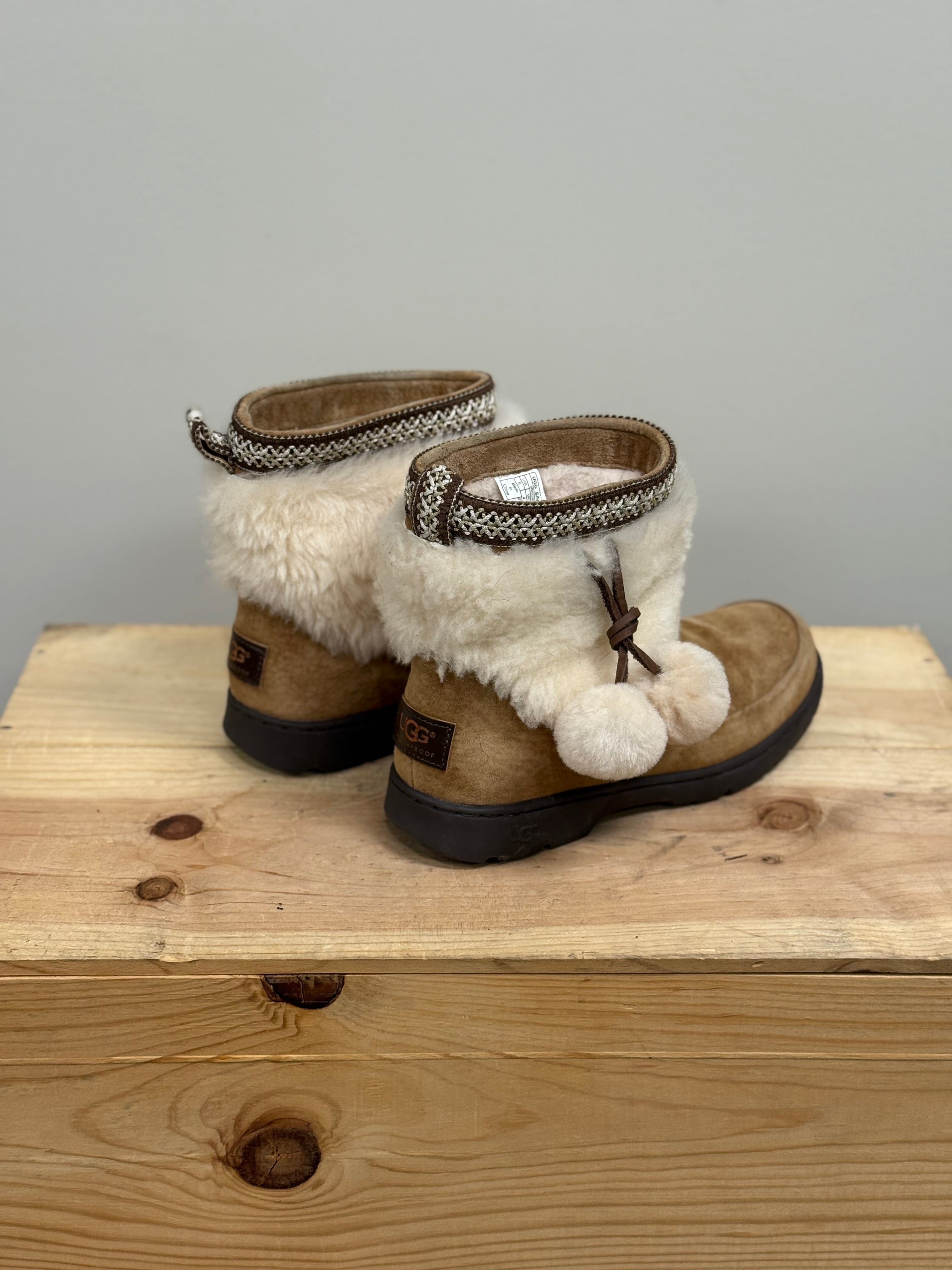 Ugg Brie sheepskin pom pom boots