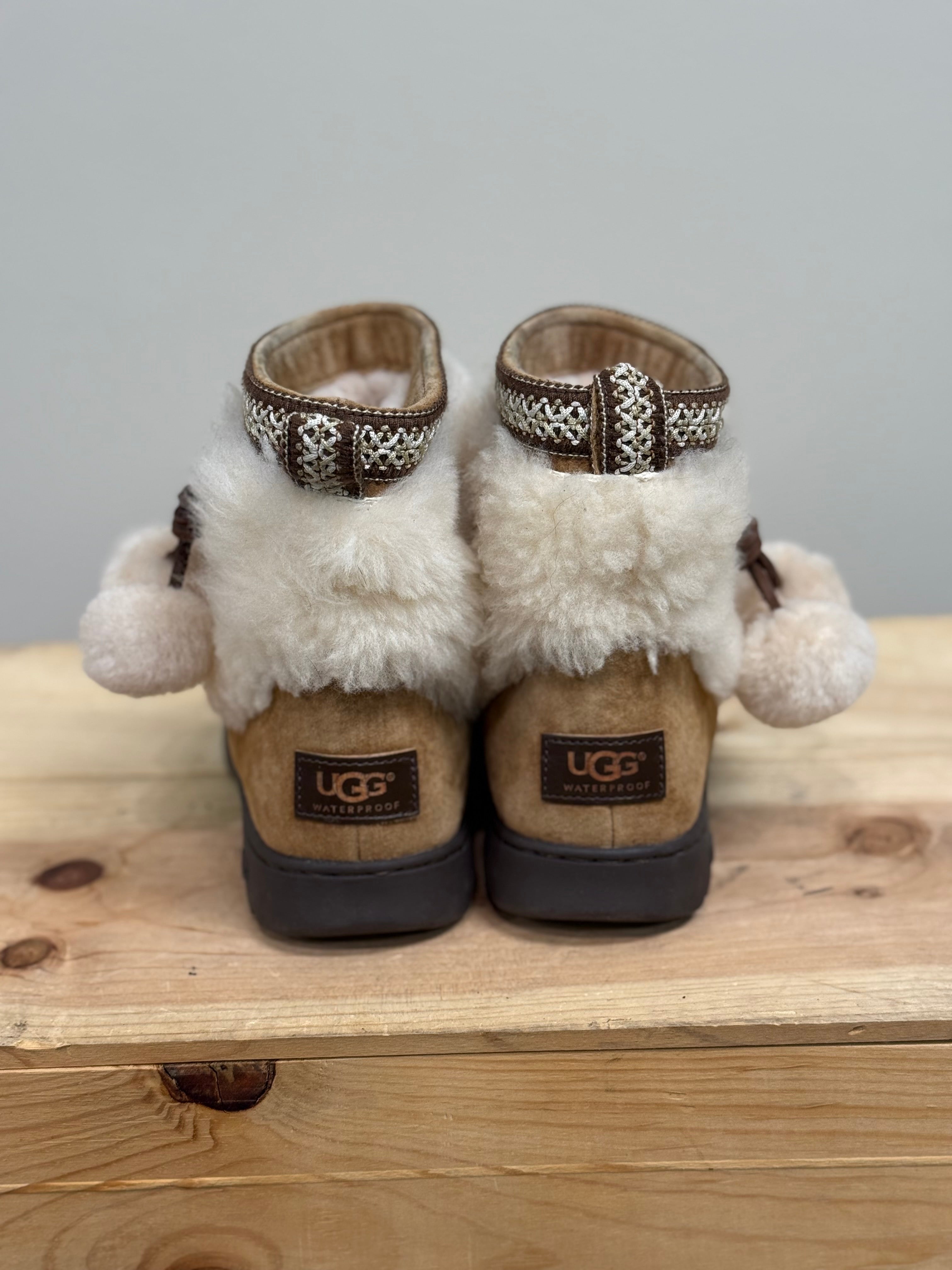 Ugg Brie sheepskin pom pom boots