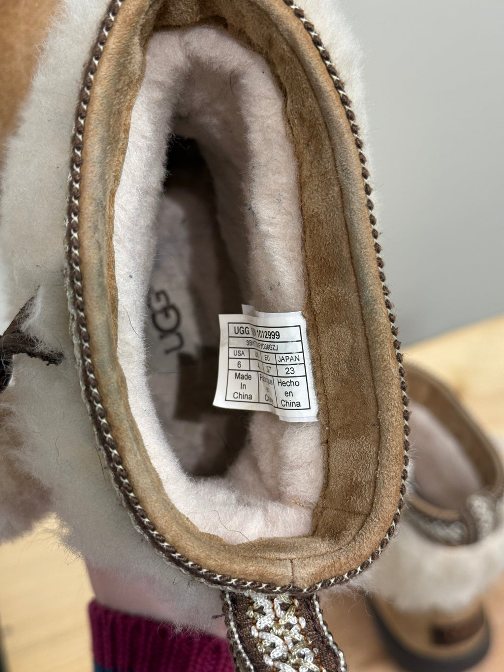 Ugg Brie sheepskin pom pom boots